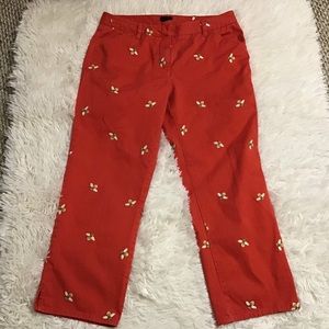 Woman’s j crew capris orange with bumblebee.